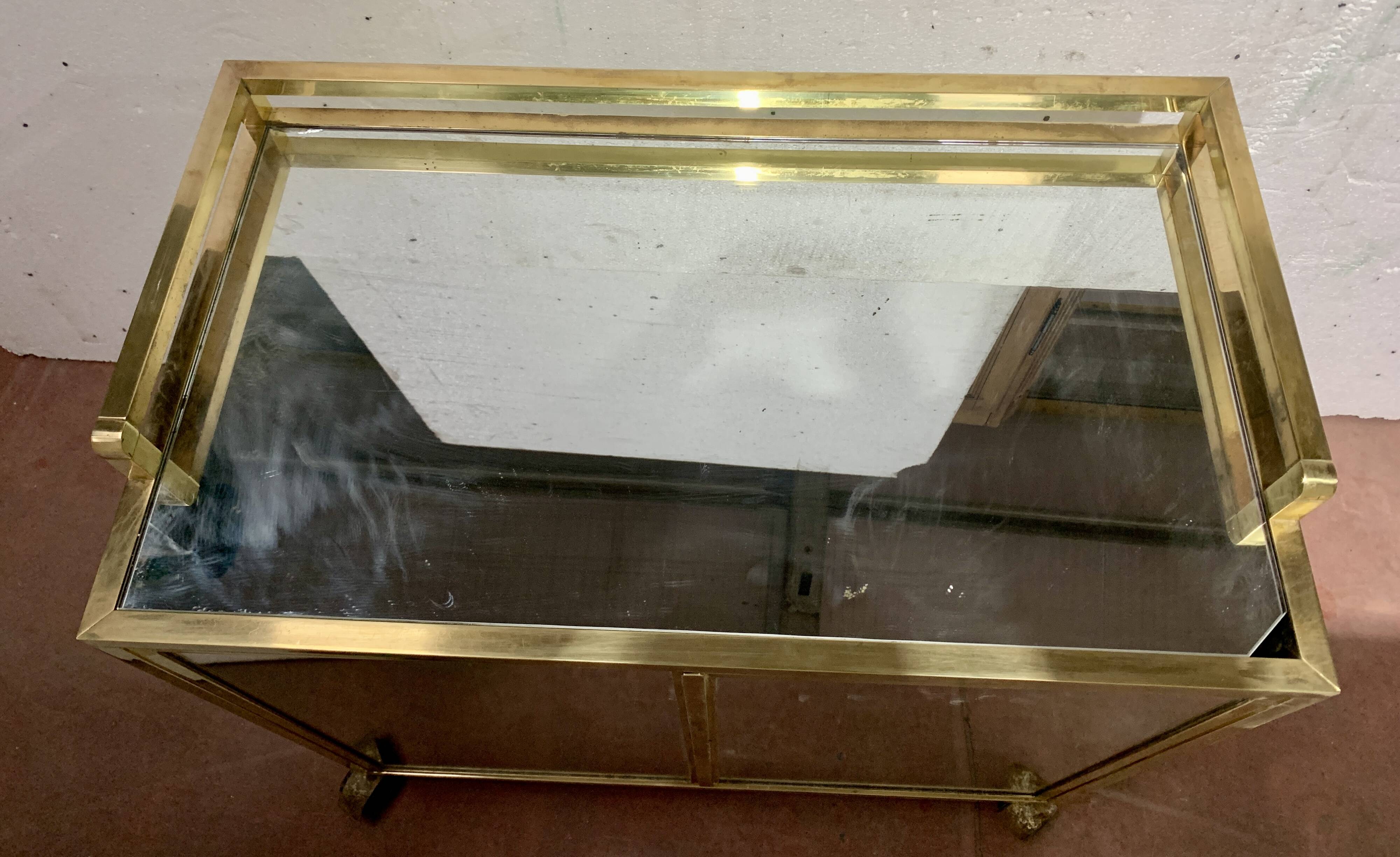 1970s brass bar with a mirrored front from the 20th century.