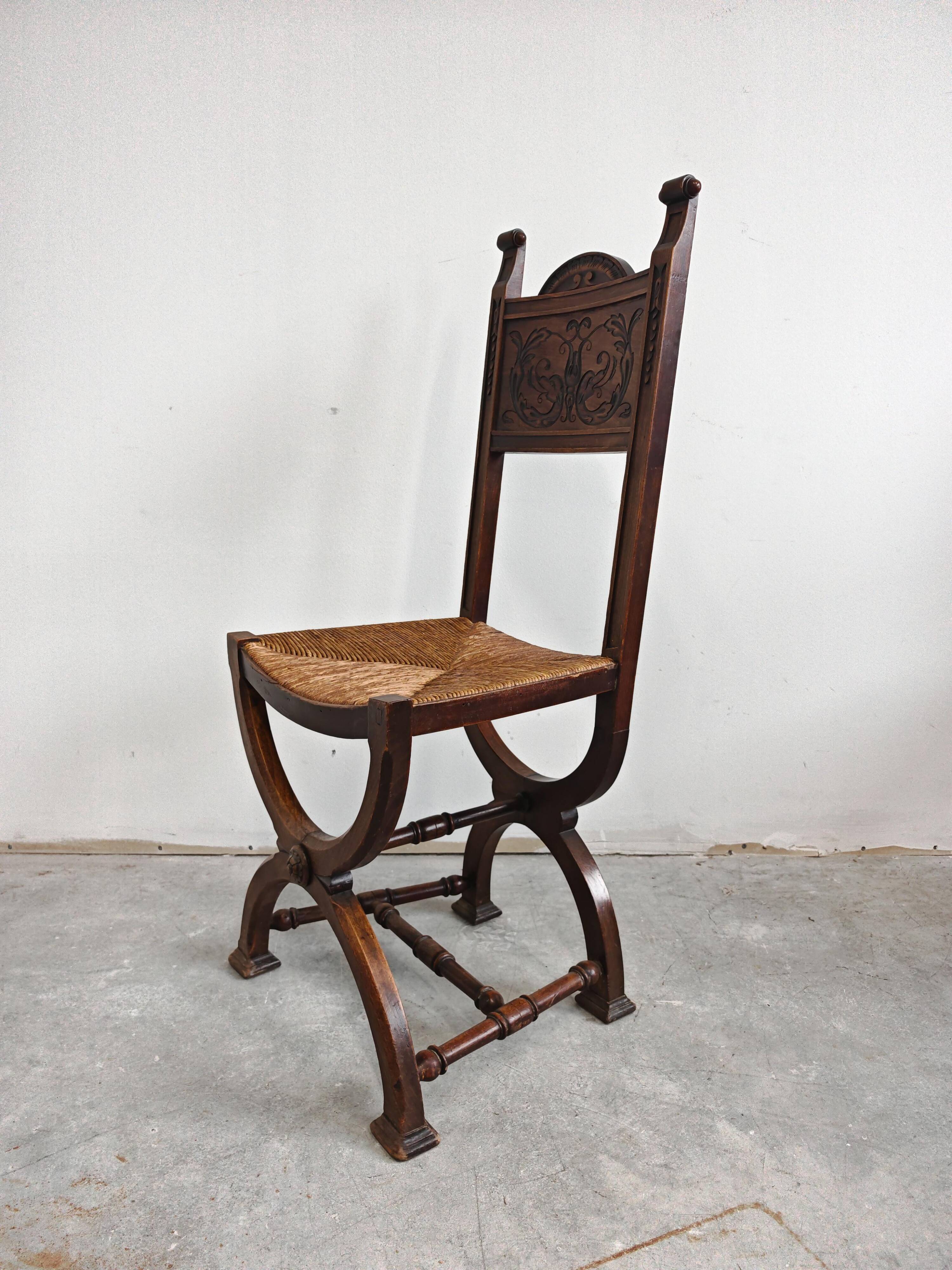 Pair of Neo-Renaissance oak chairs with straw seats, 1910