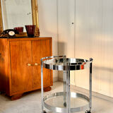 Vintage round dessert trolley in chrome steel, with two glass shelves.