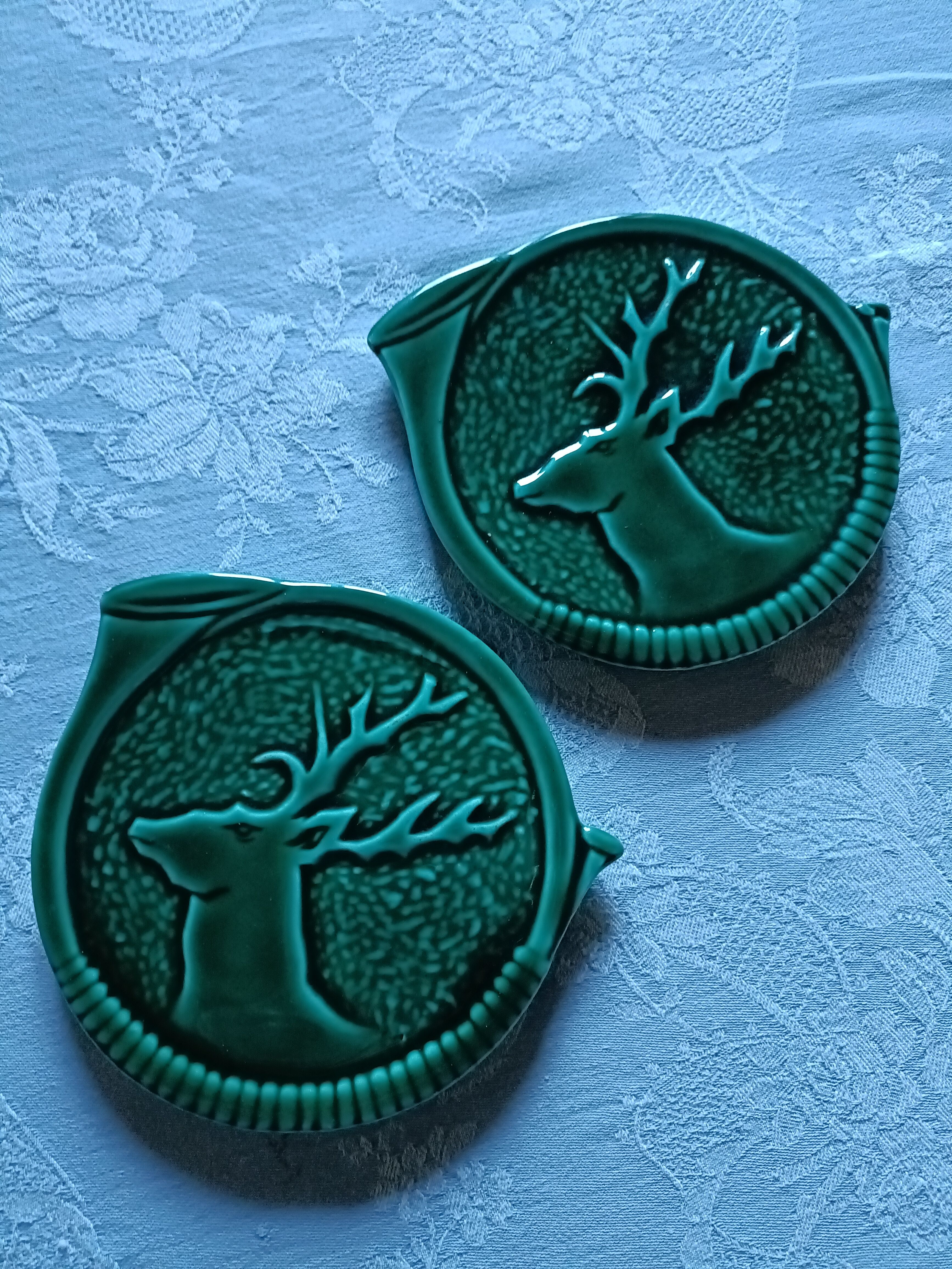 Green barbotine bottle coasters from Vallauris