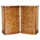 Pair of tall walnut chests of drawers with curved fronts in country style.