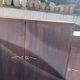 Asymmetrical antique Art Deco sideboard in rosewood veneer.