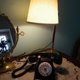 Black bakelite phone with earphone