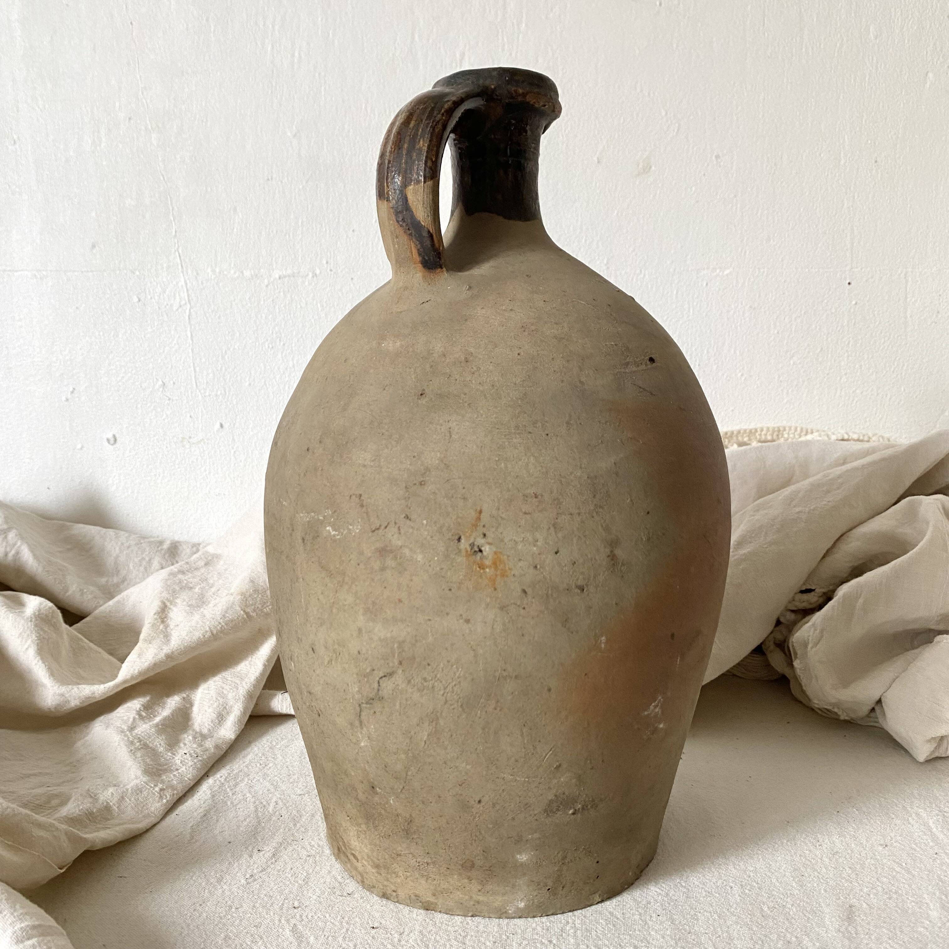 Antique jug, terracotta jar