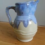 Pastel blue pitcher signed