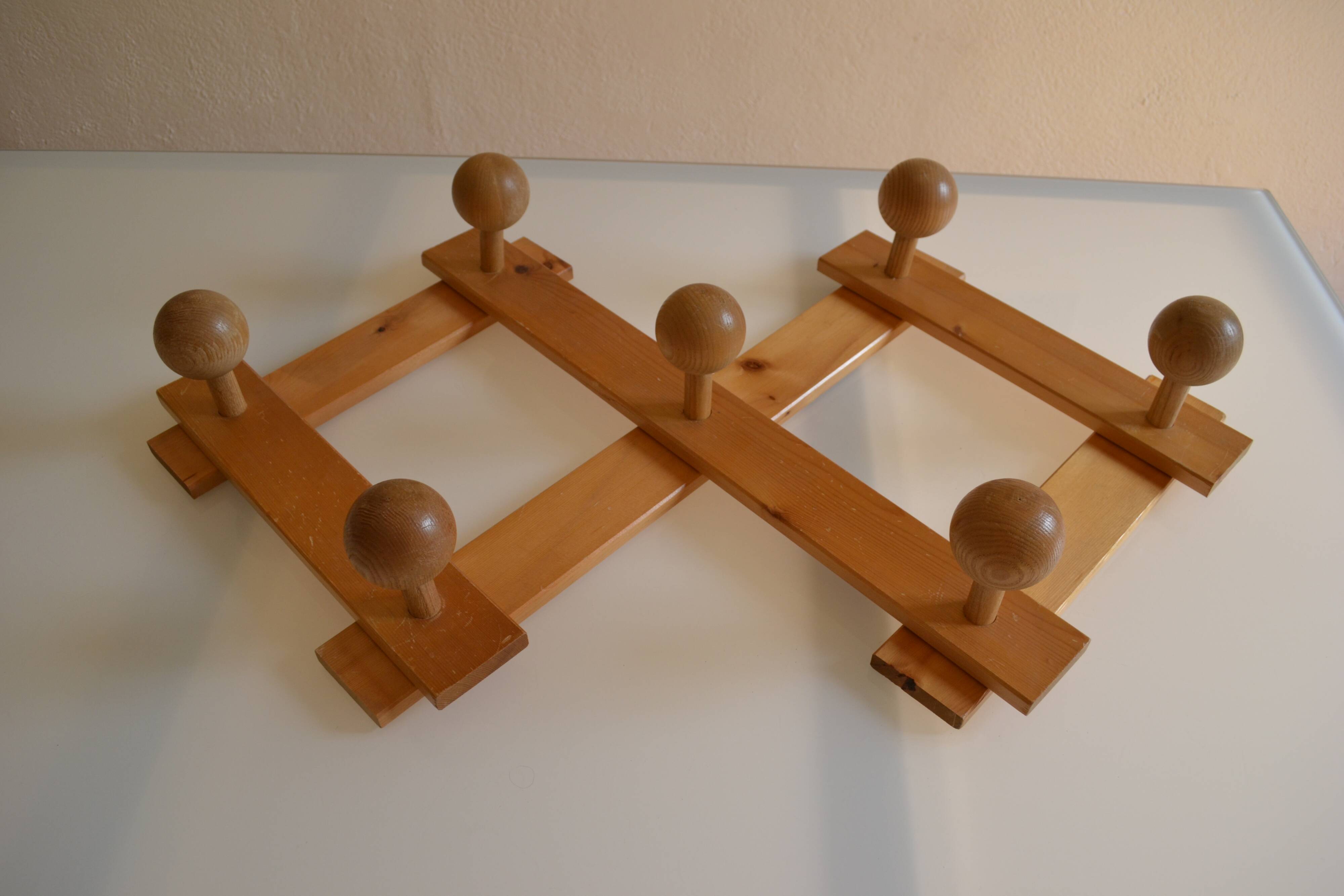 Brutalist wooden accordion wall coat rack with 7 hooks