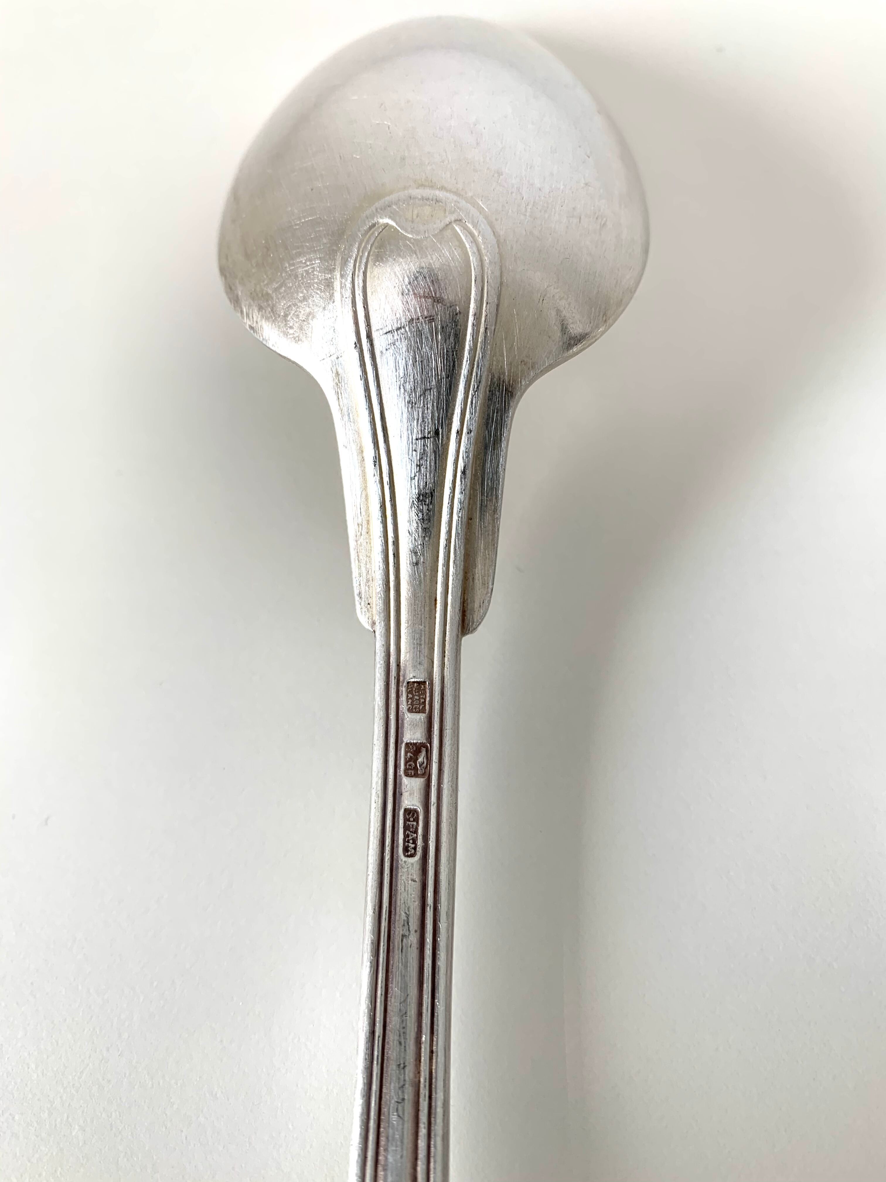 10 silver metal spoons