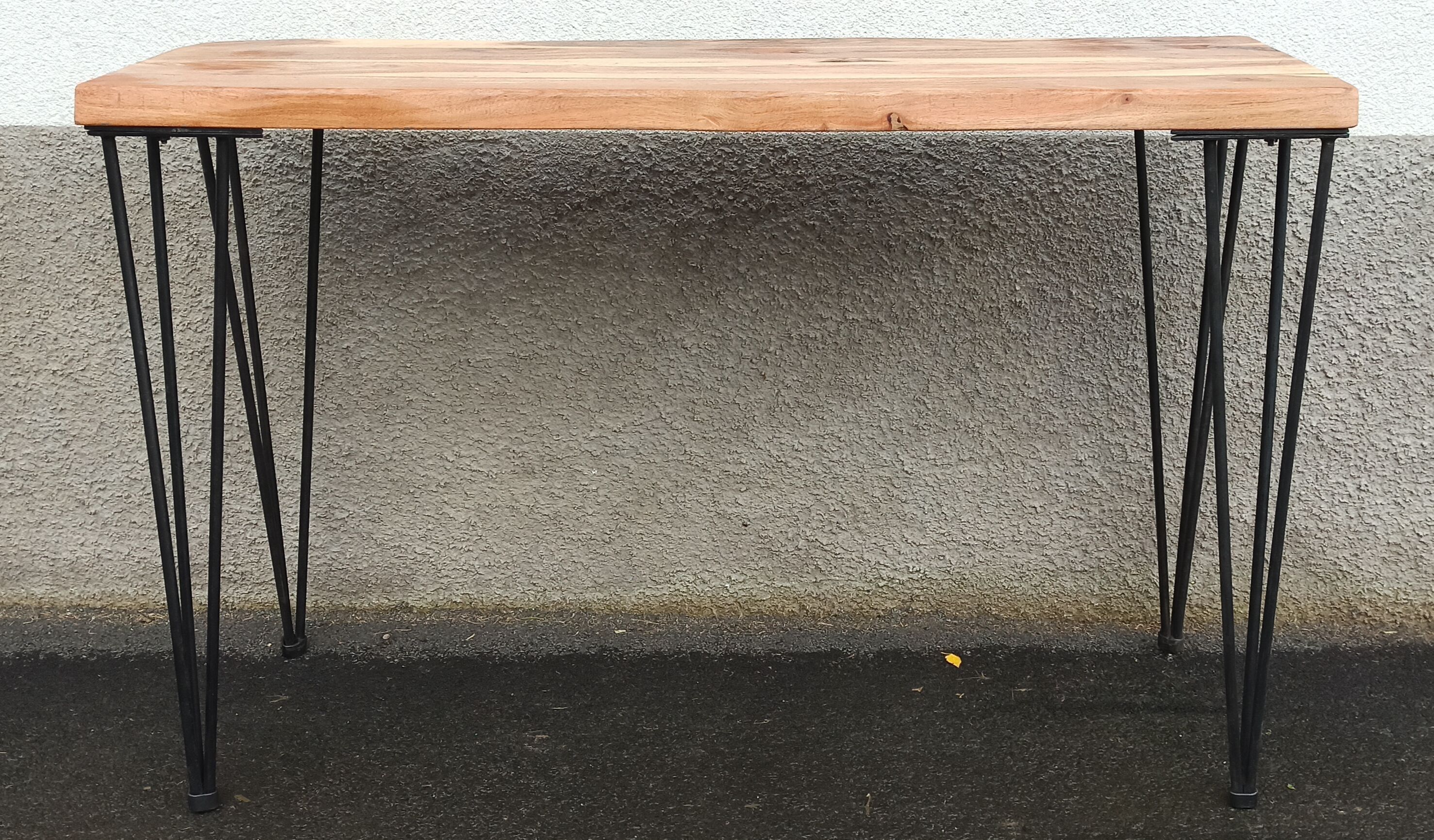 Wooden console with black metal legs