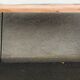 Wooden console with black metal legs