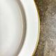 Round dish A. Vignaud in white and gold Limoges porcelain