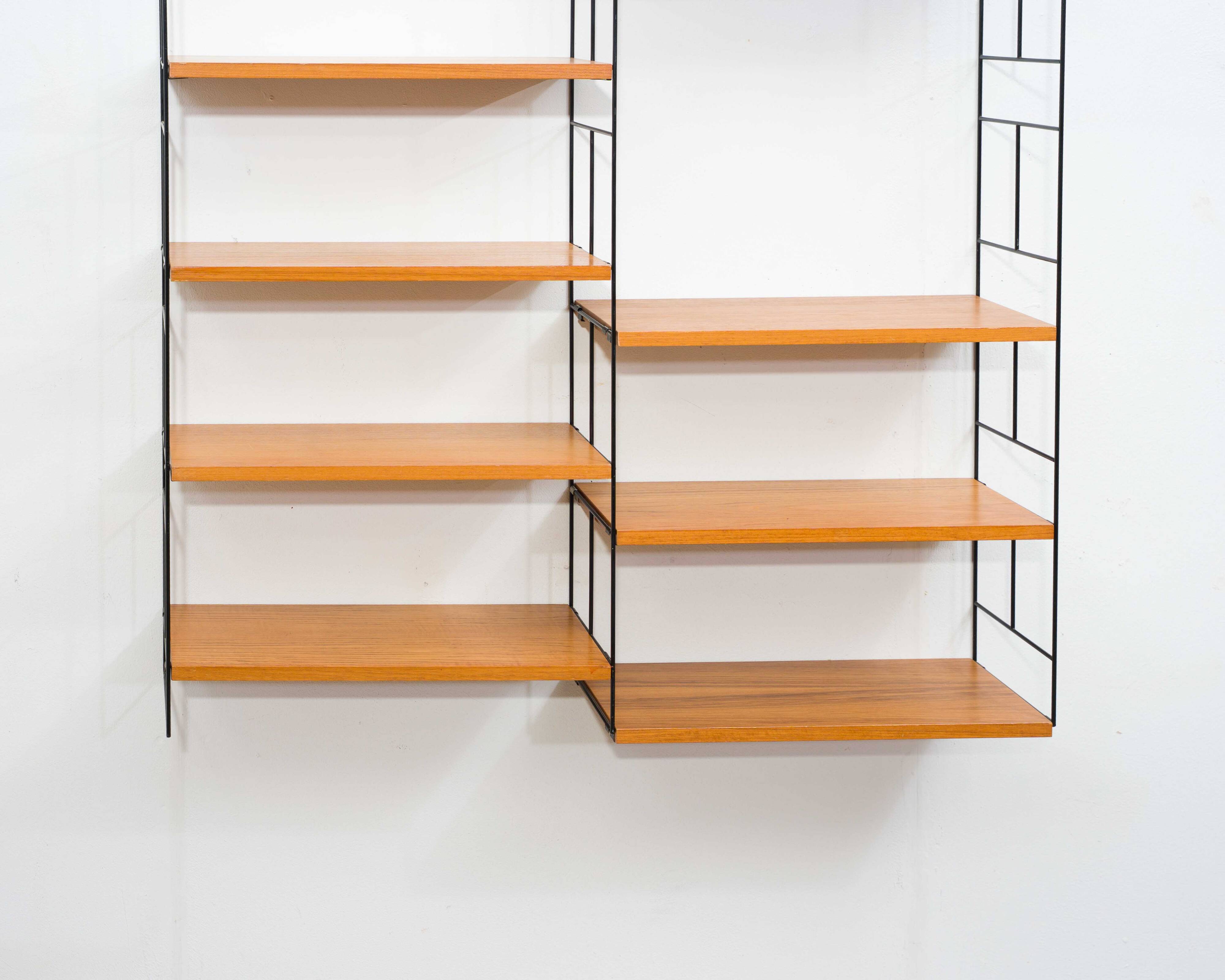 1960s teak wall shelf, manufacturer WHB, eight shelves