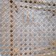 Pair of old caned chairs in blond wood