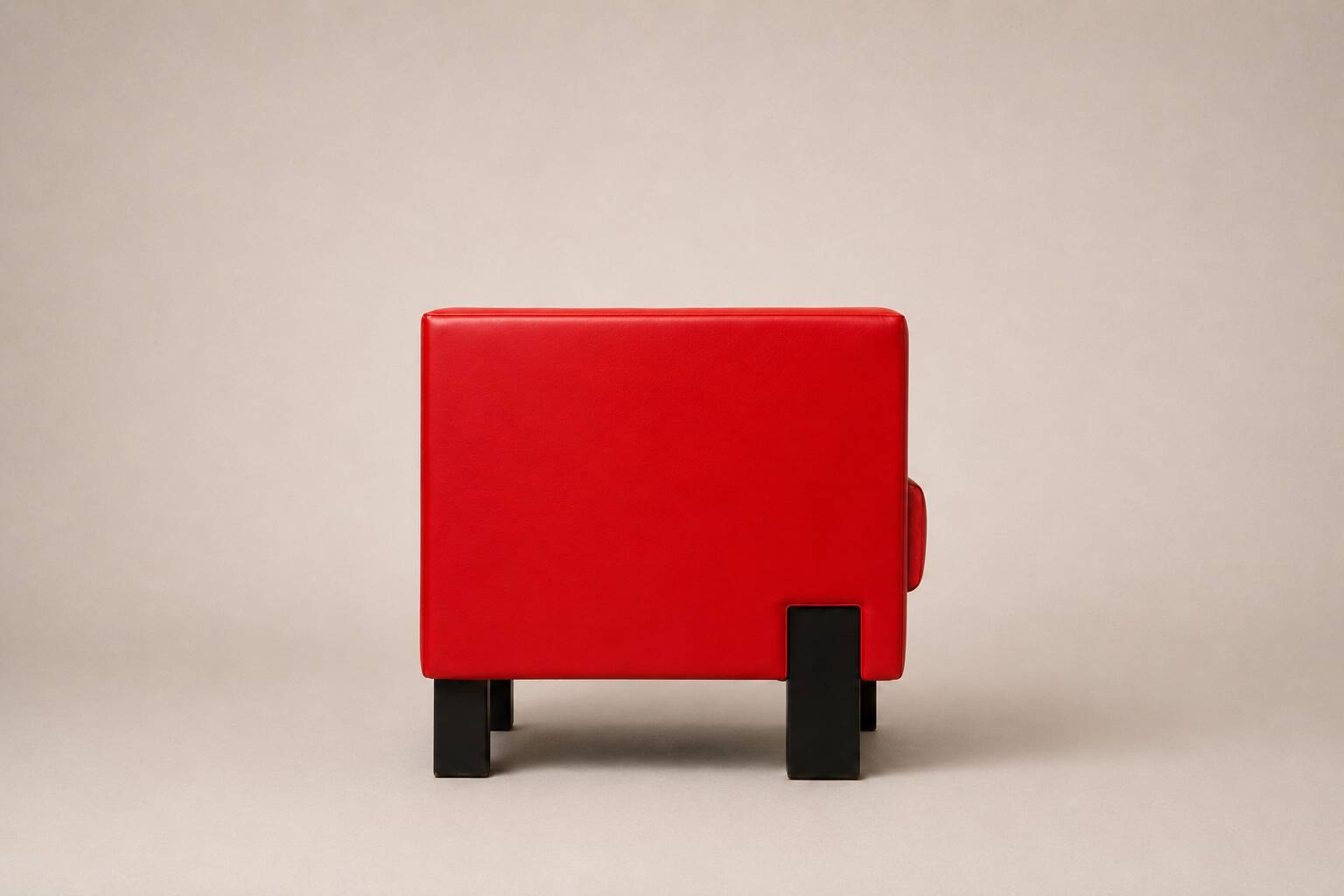 Uchida x Poltrona Frau — Pair of "Moji" armchairs in red leather