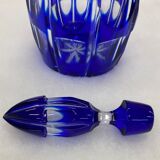 Midnight blue carafe with multiple reflections