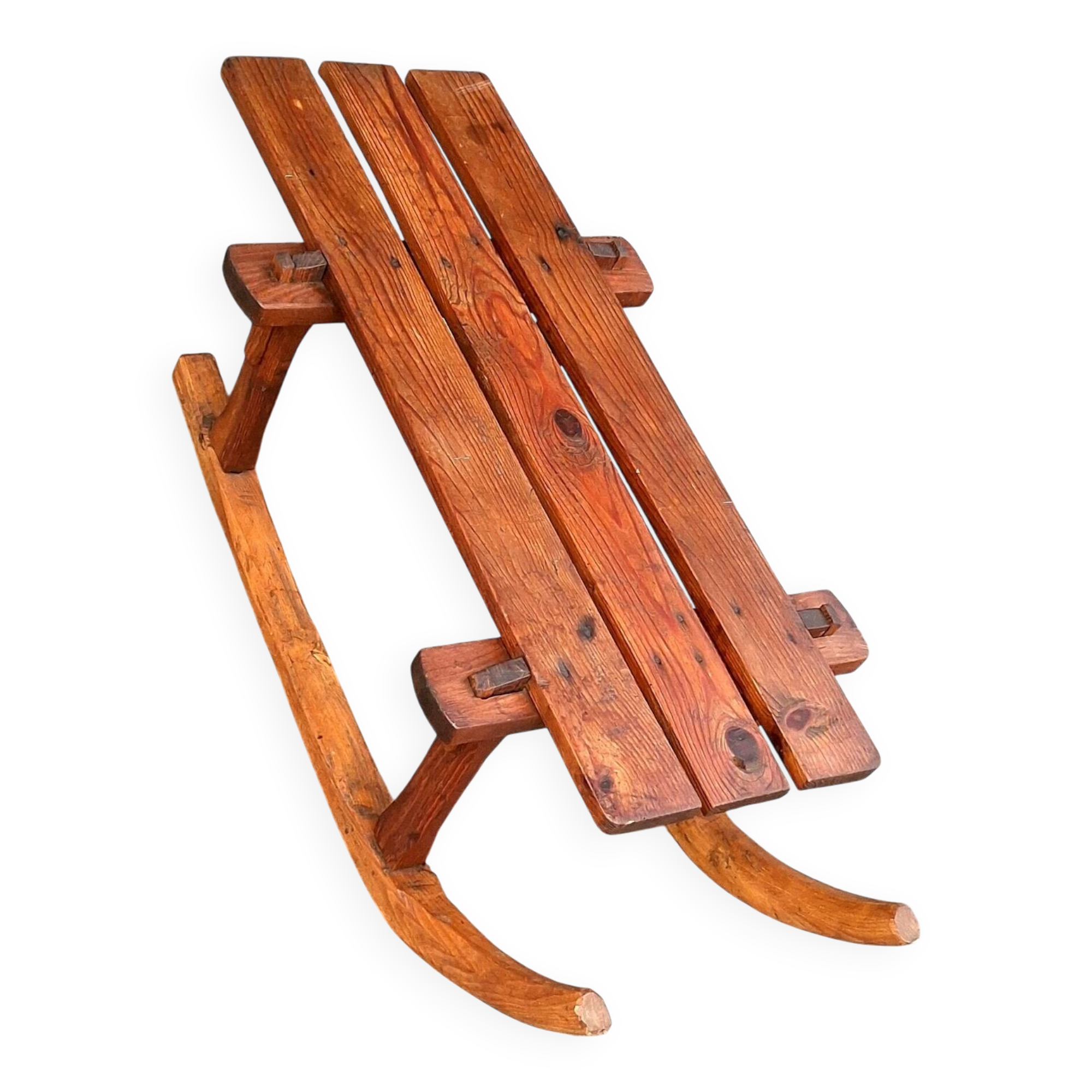 Rustic bench, old folk art, snow sled, Alps.