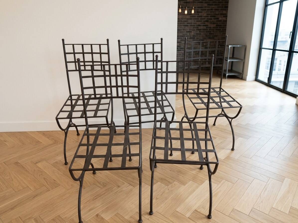 Set of 5 black metal industrial style garden chairs.