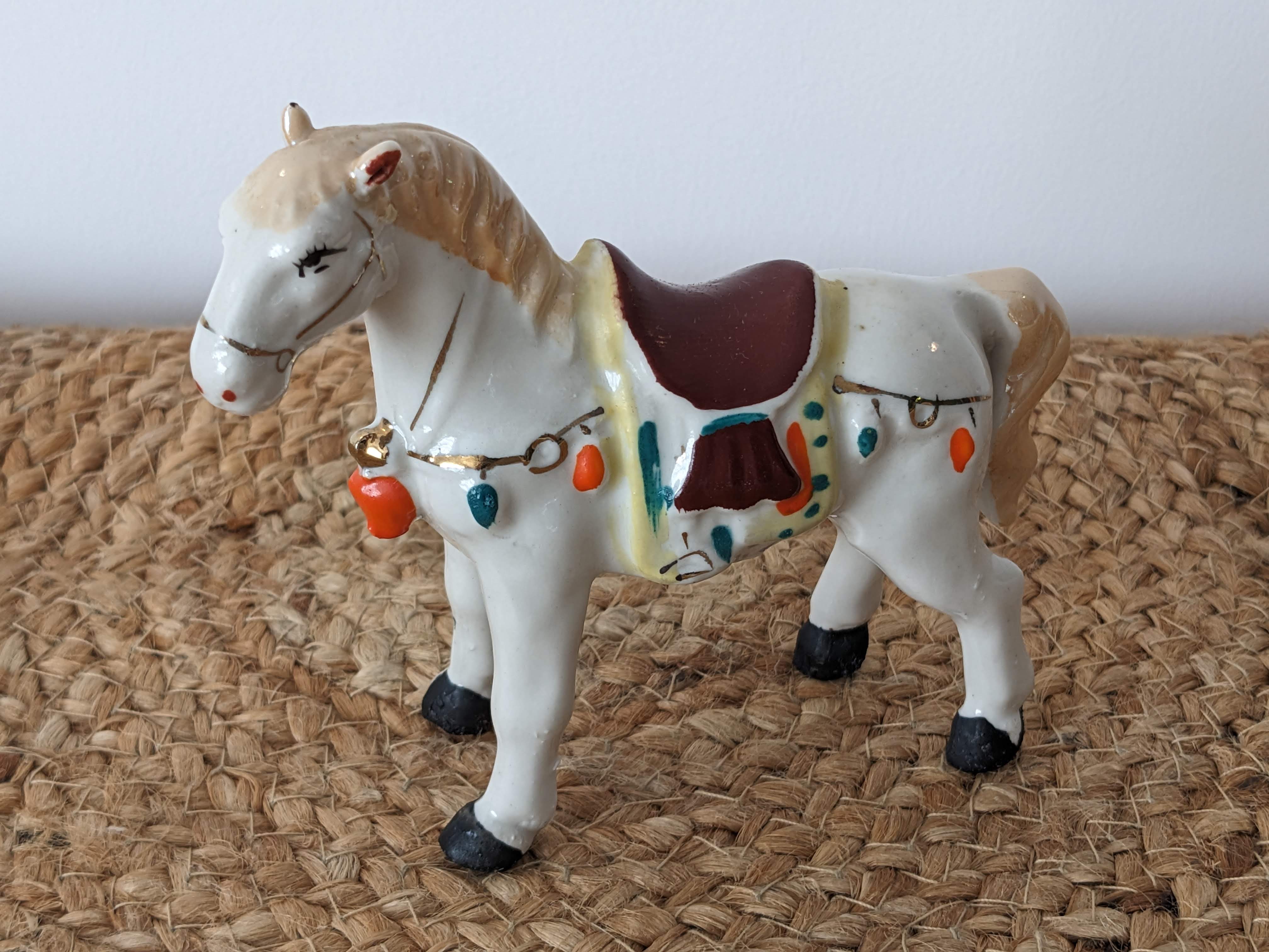 Painted porcelain horse statuette
