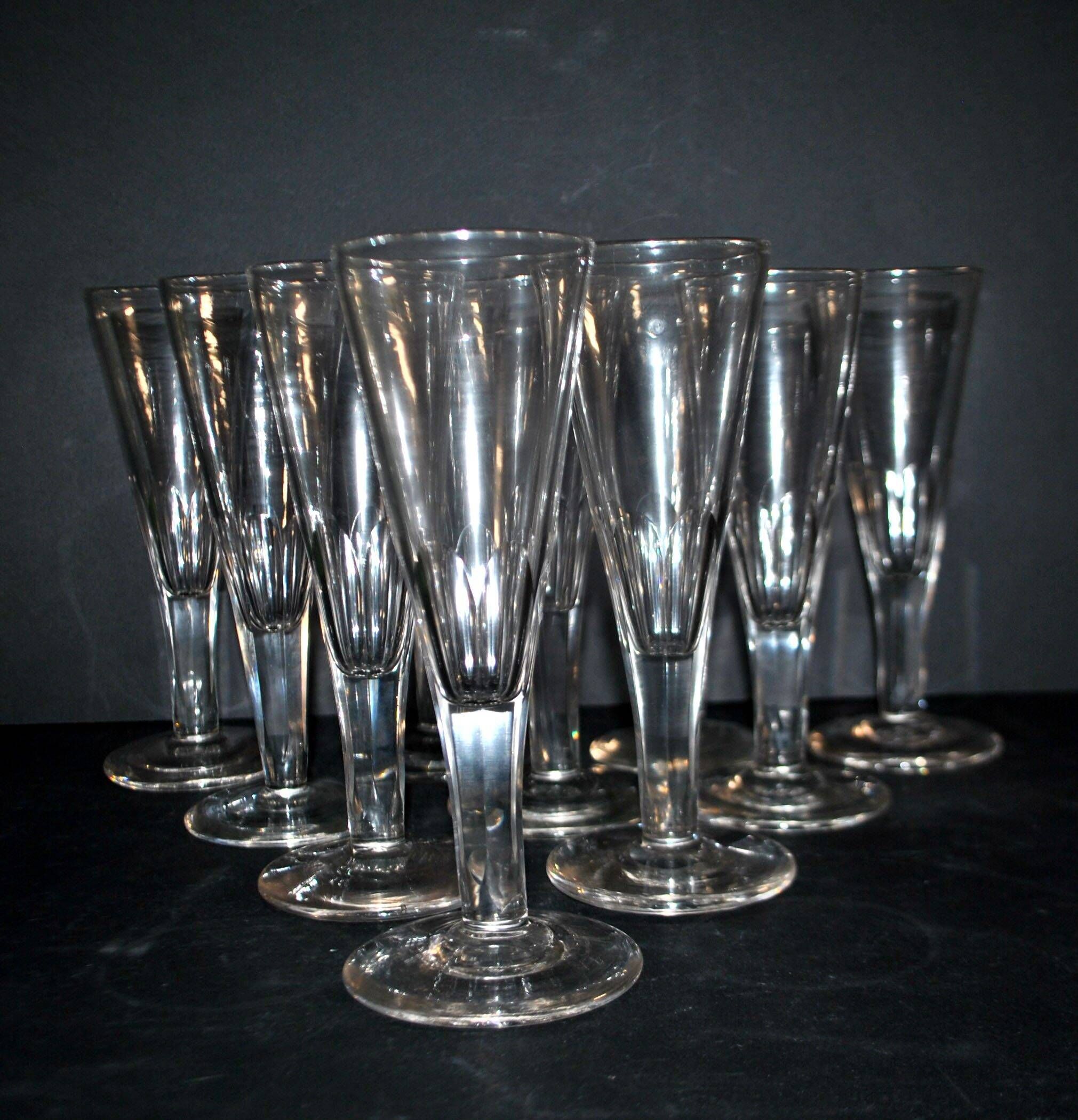 Portieux? Meisenthal? Set of 10 cut glass champagne flutes with flat sides from 1900.