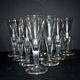 Portieux? Meisenthal? Set of 10 cut glass champagne flutes with flat sides from 1900.