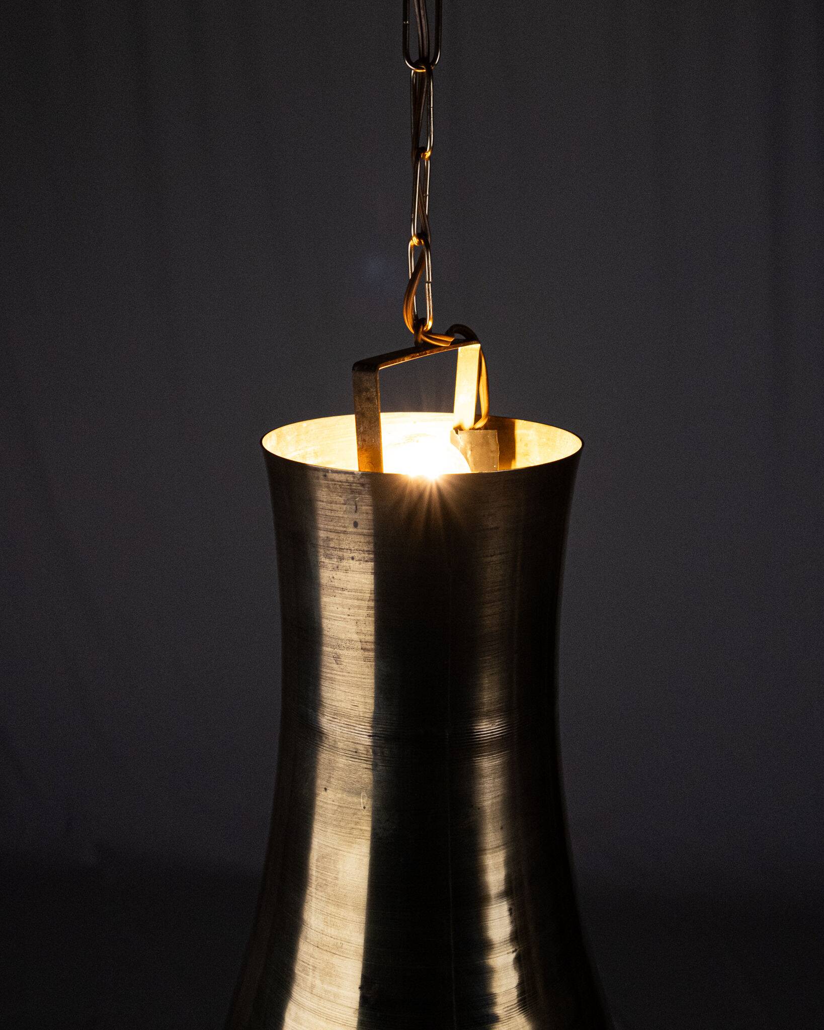 Pair of brass pendants, hourglass shape, 1960s