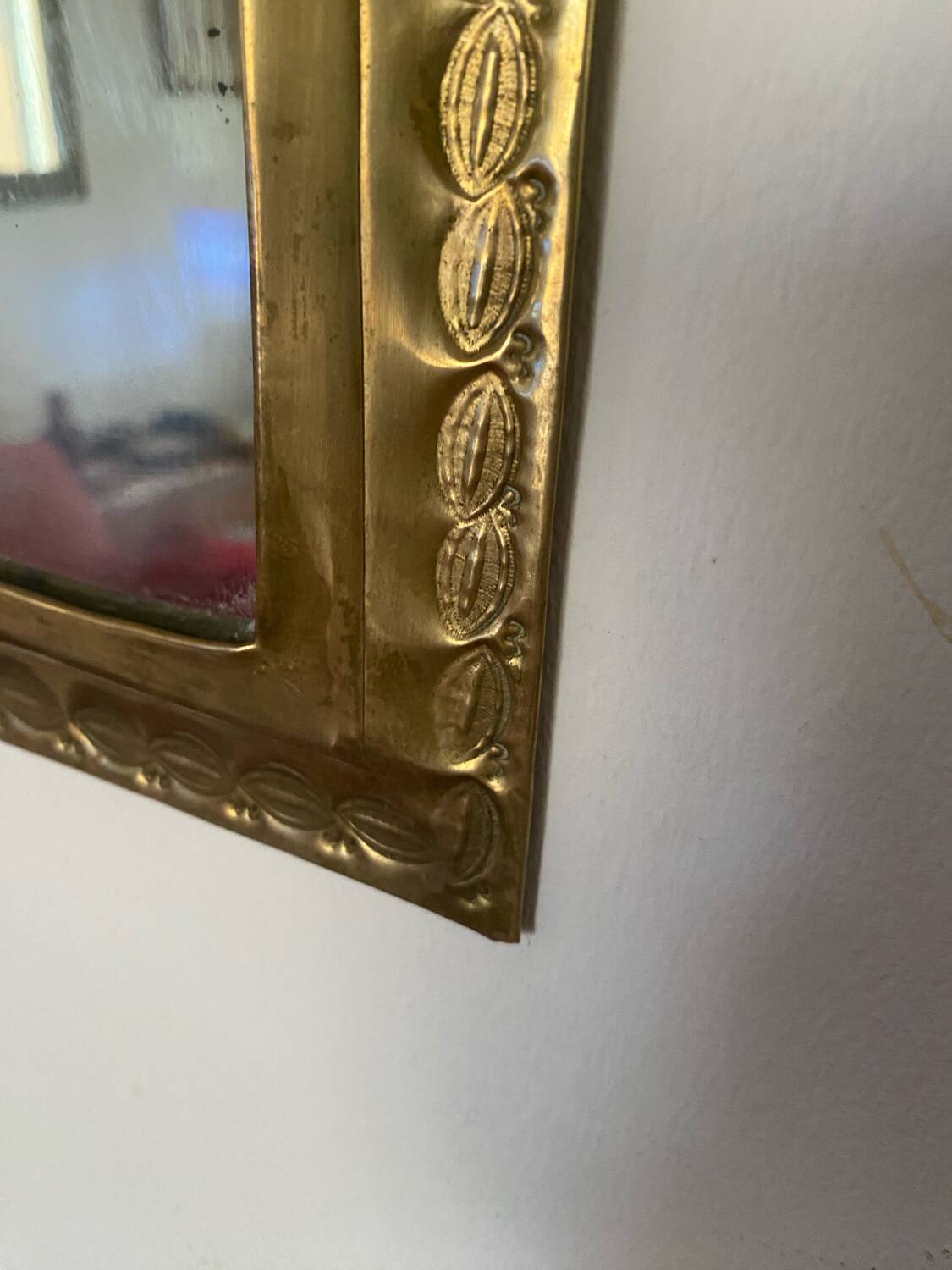 Ethnic brass mirror crafted in the 1980s.