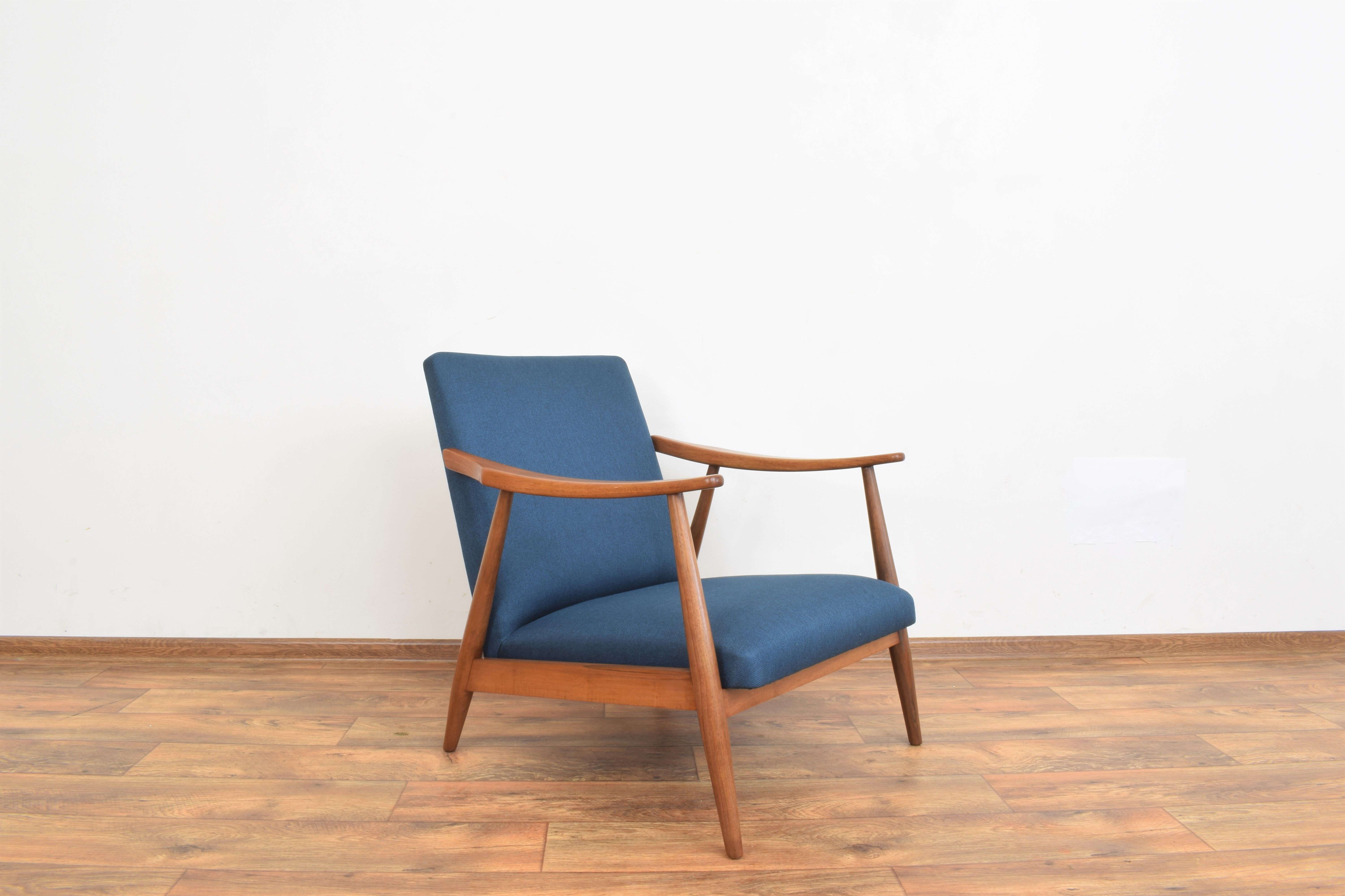 Teak desk and walnut armchair