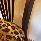 Pair of vintage wood and leopard chairs