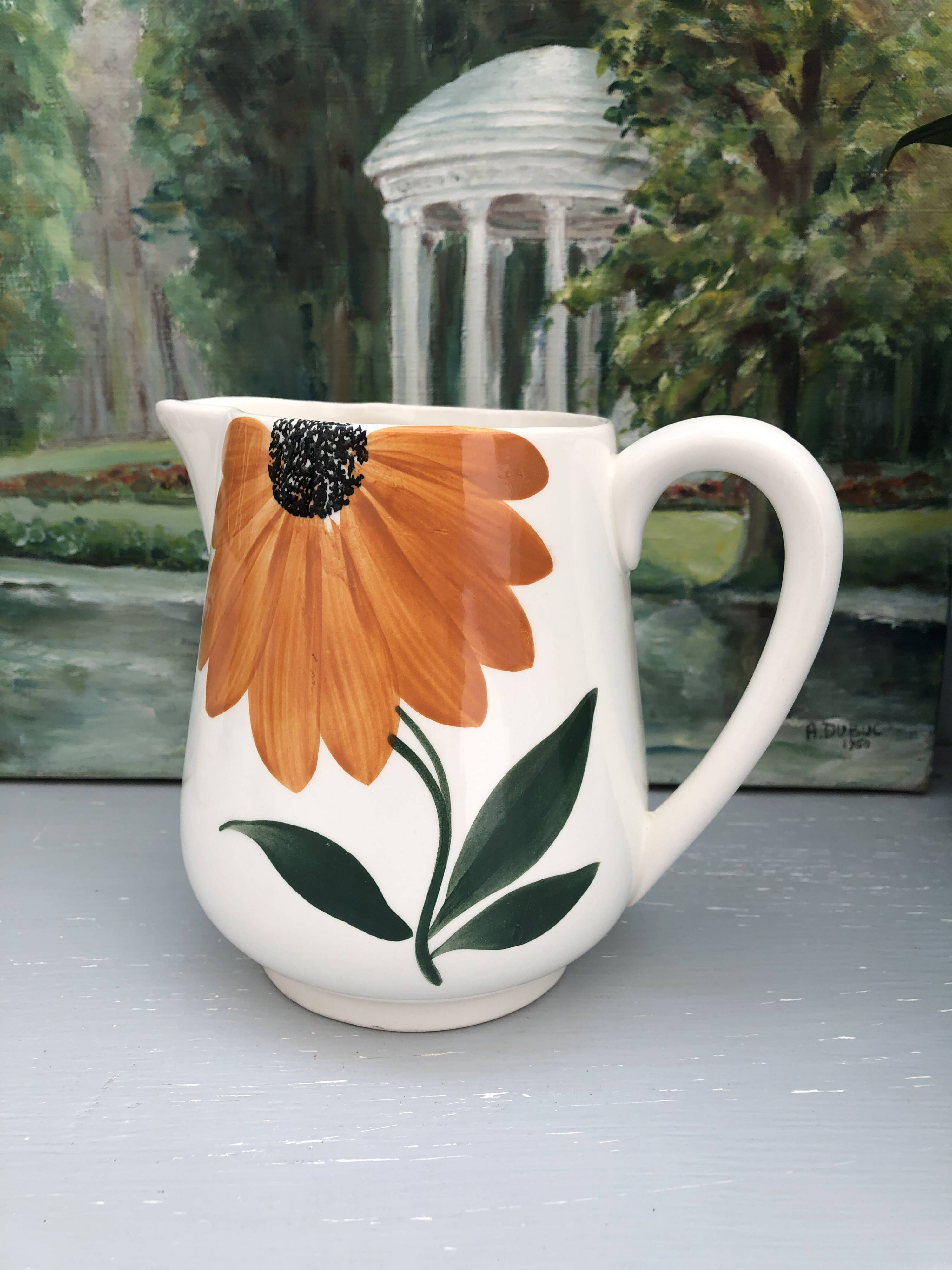 Vintage pitcher in Gien earthenware – daisy floral decoration / orange