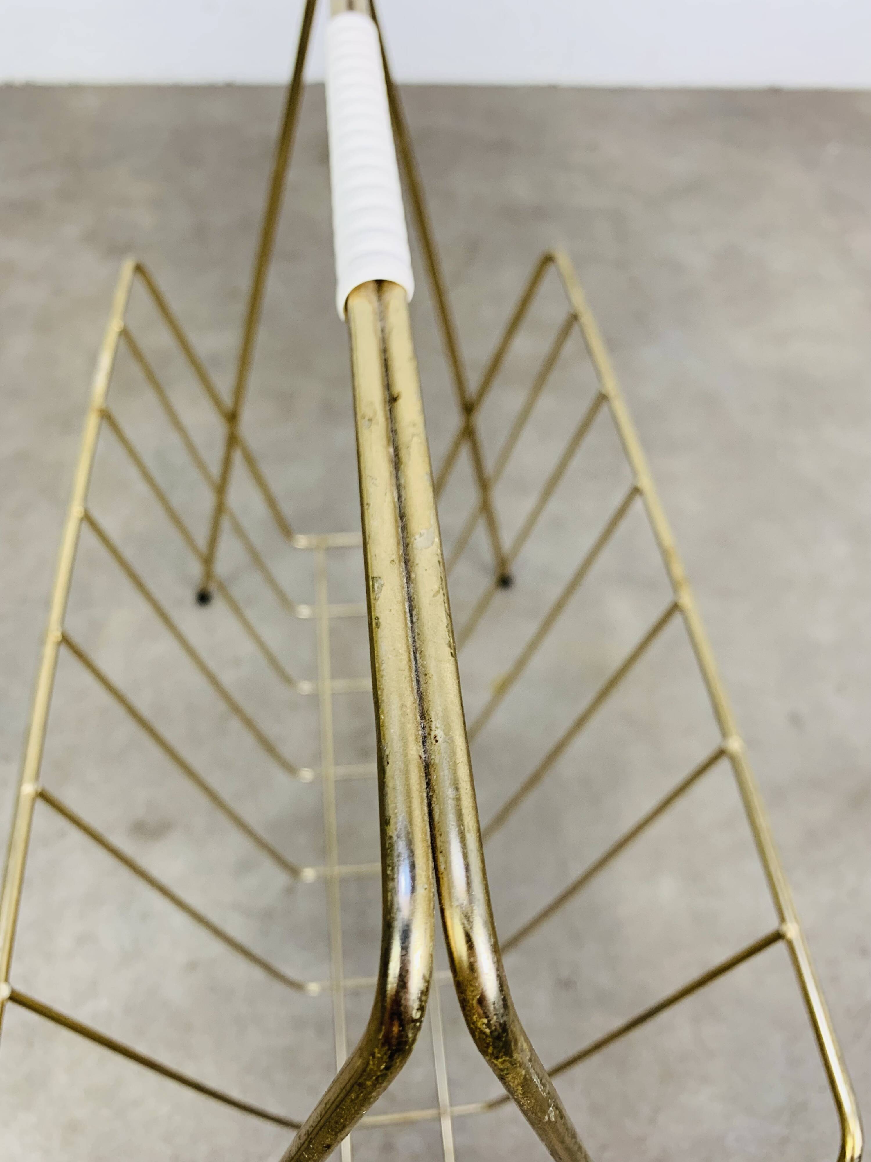 Porte-revue métal doré années 60