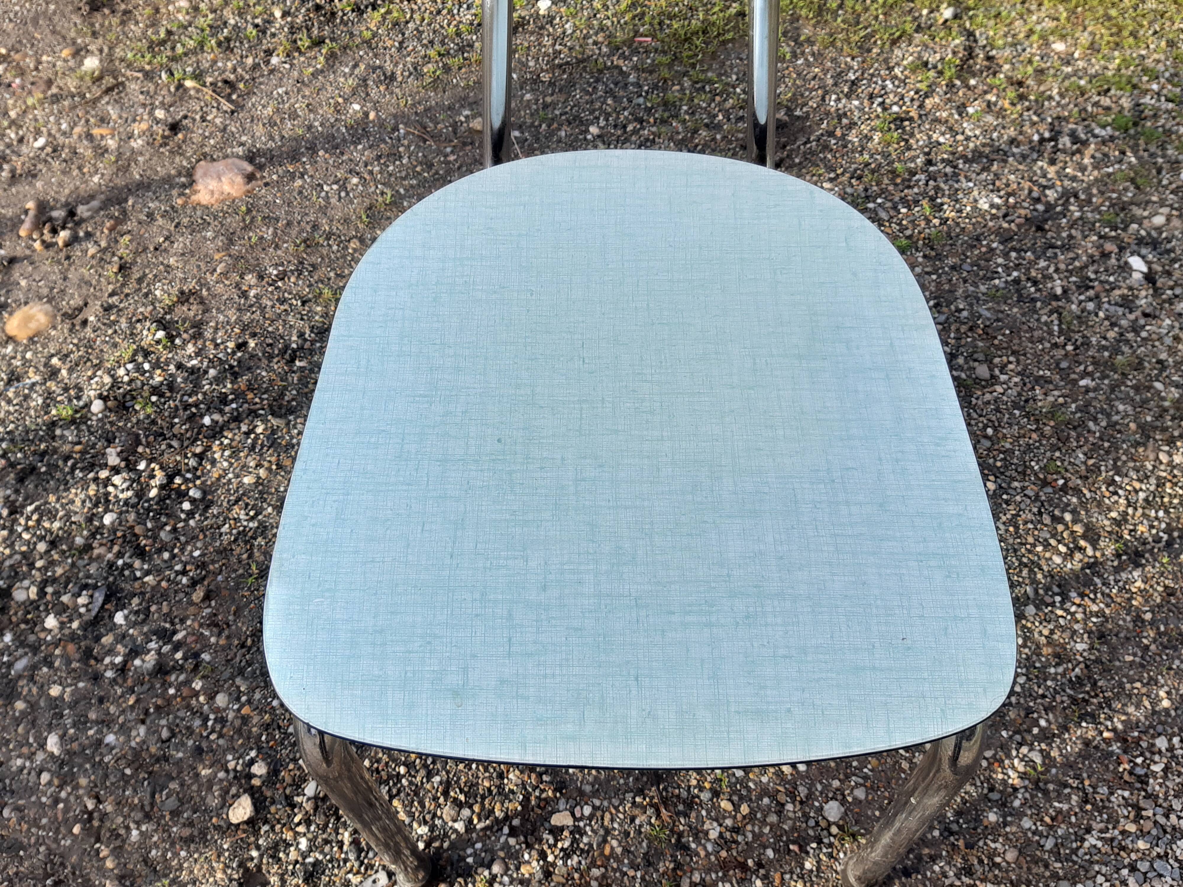 Table et 4 chaises formica vintage de marque Colmon