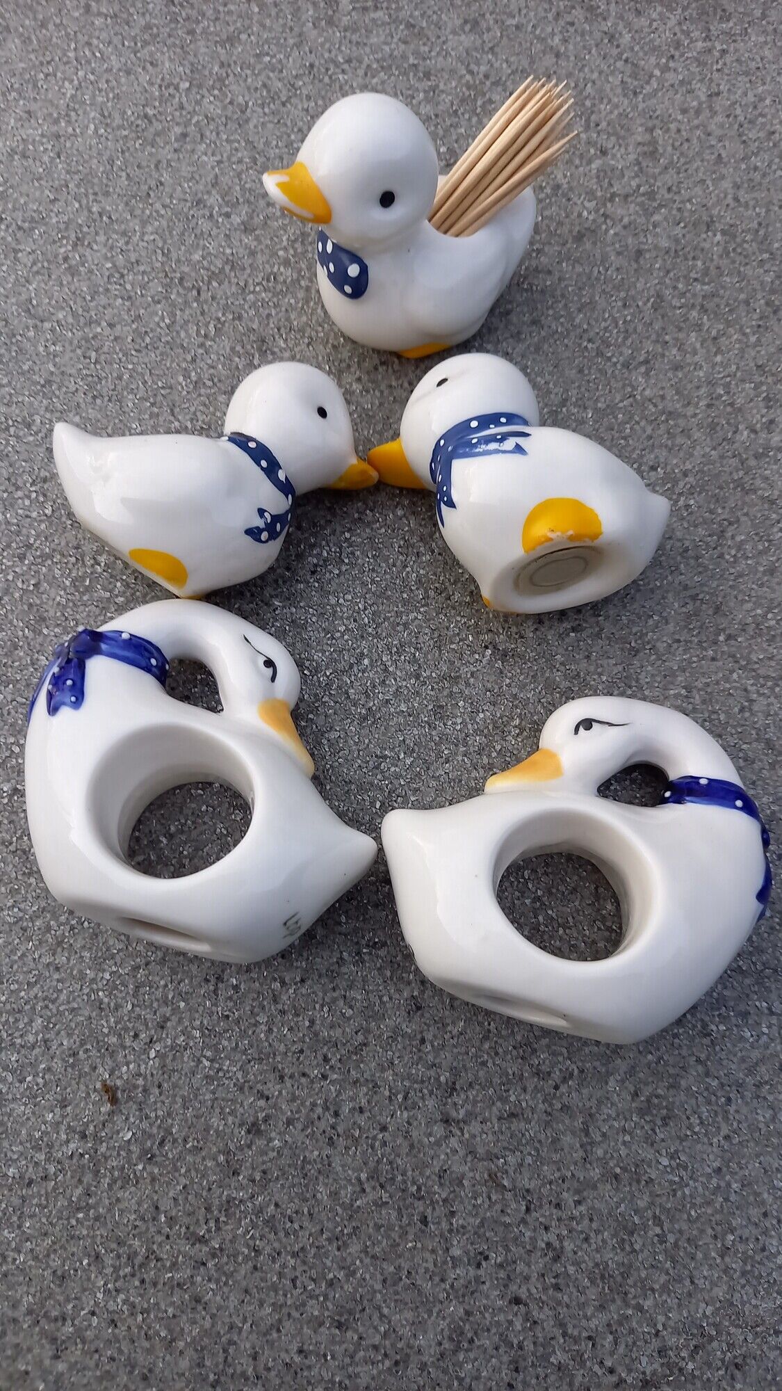 Salt shaker, pepper shaker, toothpicker, napkin rings ducks and porcelain swans