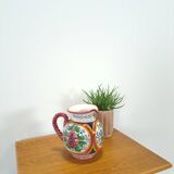 Porseleinen vintage roze kan met bloemen