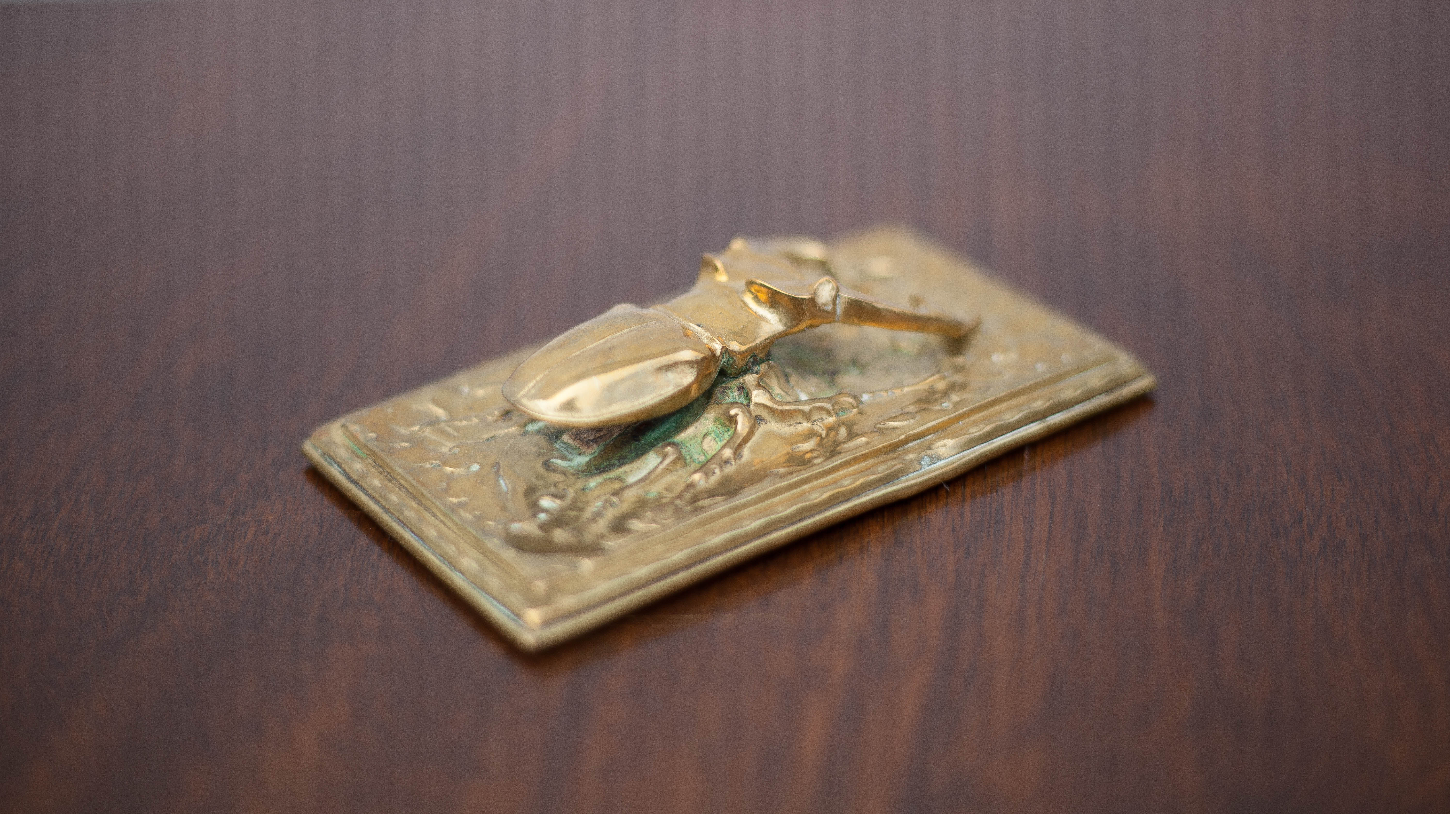 Scarab brass mail clip