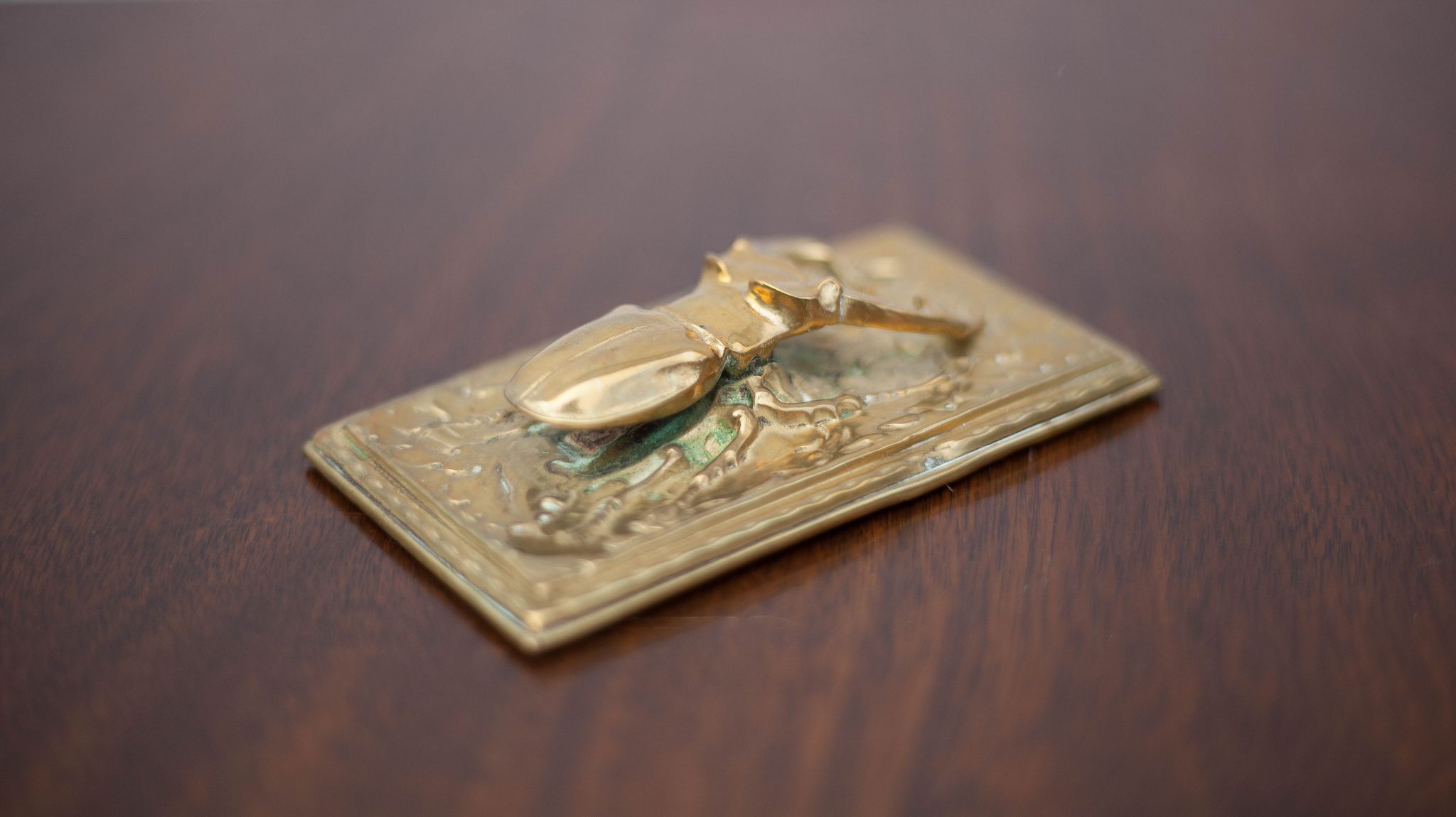 Scarab brass mail clip