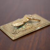 Scarab brass mail clip