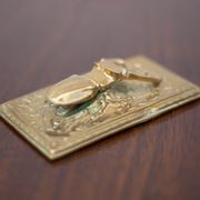 Scarab brass mail clip