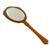 Chic coral orange hand mirror with a mother-of-pearl back – elegant retro style.