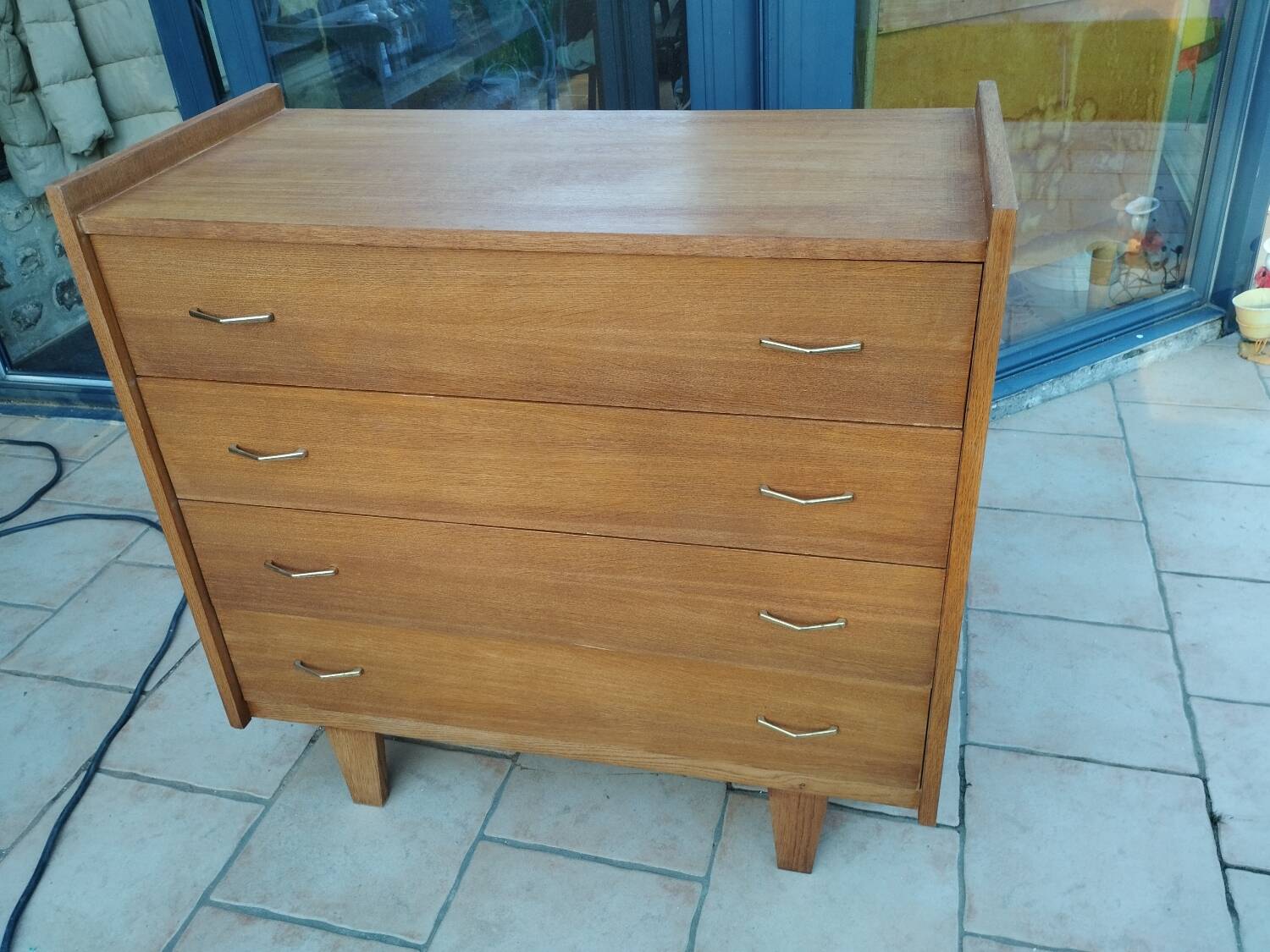 Old vintage chest of drawers with compass feet