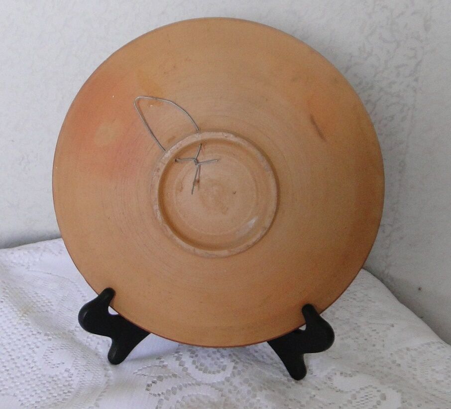 Decorative plate in engraved and painted terracotta signed verdo