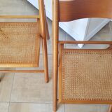 2 folding chairs in cannage