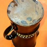 Glazed terracotta pitcher decorated with beaded friezes