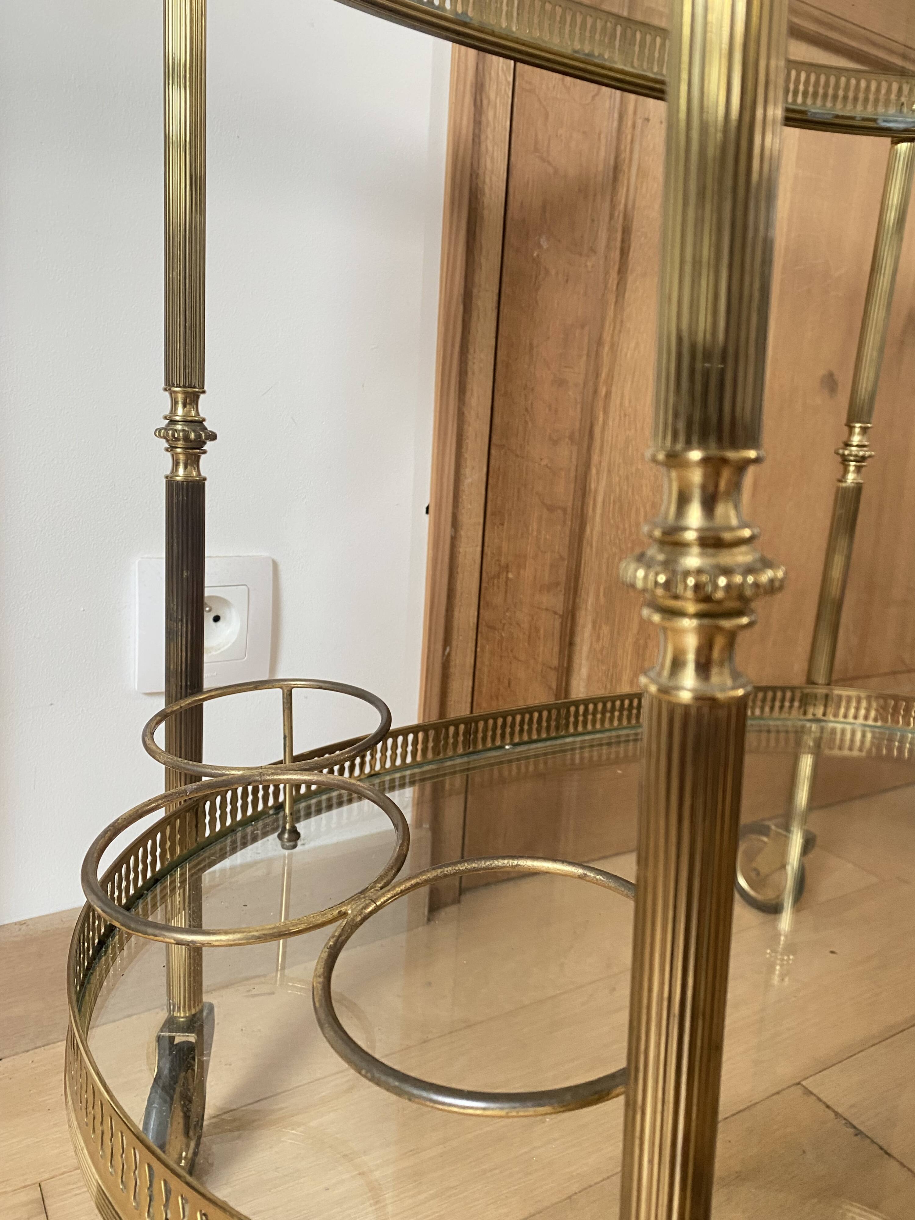 Oval golden brass rolling dessert trolley, Maison Jansen style, 1960s.