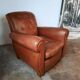 Ancien fauteuil club en cuir, vers 1940 style art déco