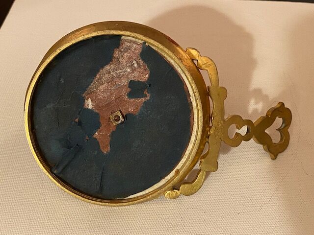 Hand-held rat tail in gilded brass and red marble