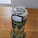 Vintage glass bottle l'Idéale with porcelain stopper