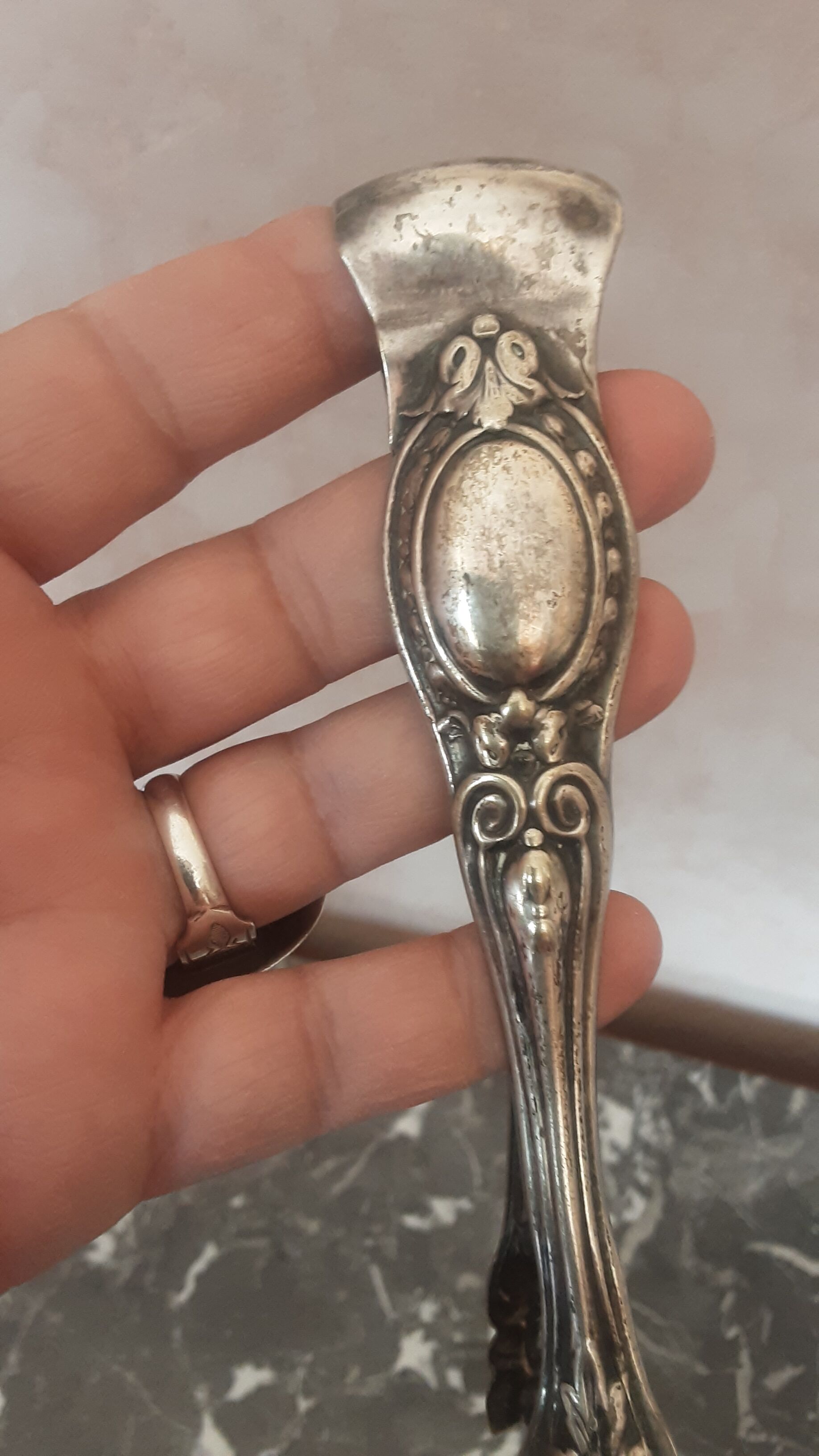 Antique silver metal sugar clamp