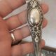 Antique silver metal sugar clamp