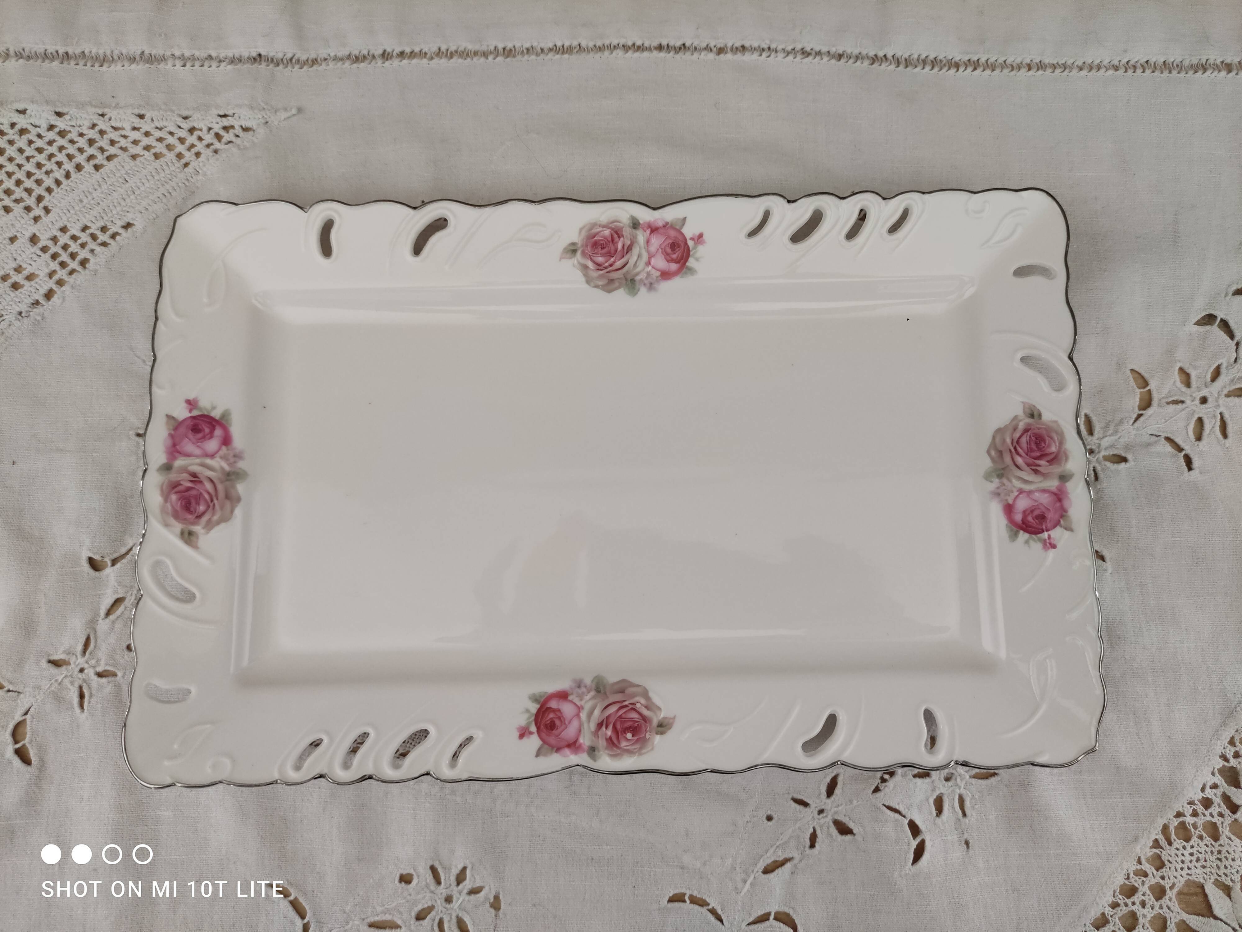 Rectangular dish in german porcelain white openwork bordered silver and old pinks