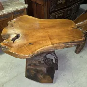 Sculpted olive wood table, made from a root.