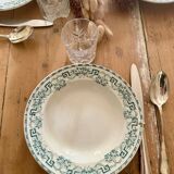 Set of eight Moulin des loups soup plates